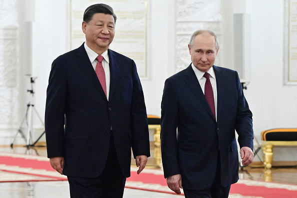 Chuyên gia phân tích ngôn ngữ cơ thể của ông Putin và ông Tập trong cuộc gặp